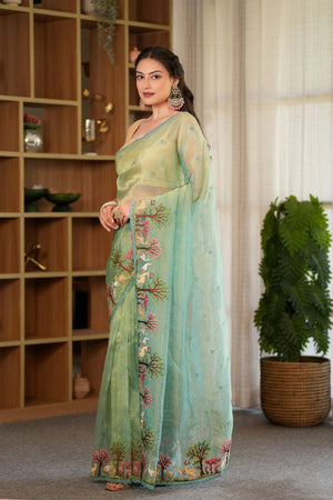 Anika : Teal shade of Embroidered tissue saree with unstitched blouse Sathiraa Sarees