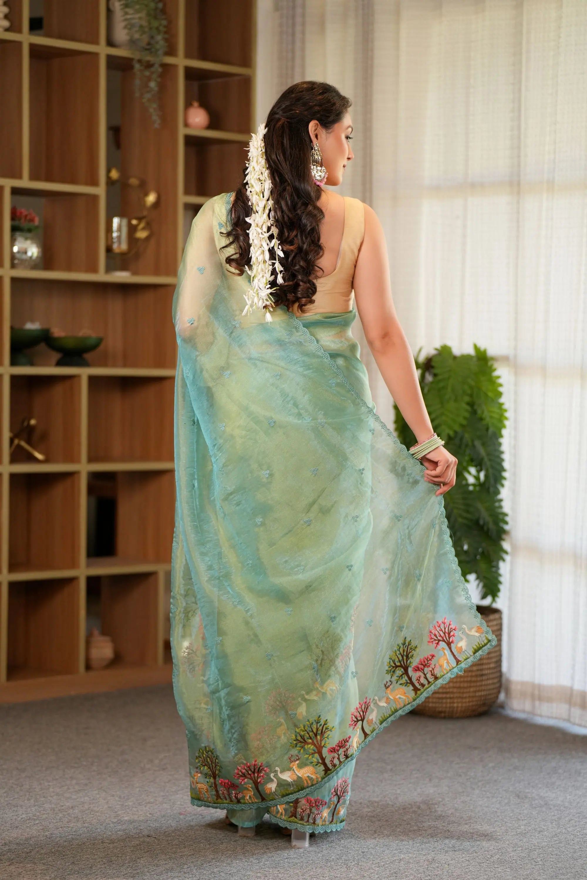 Image of Anika : Teal shade of Embroidered tissue saree with unstitched blouse Sathiraa Sarees