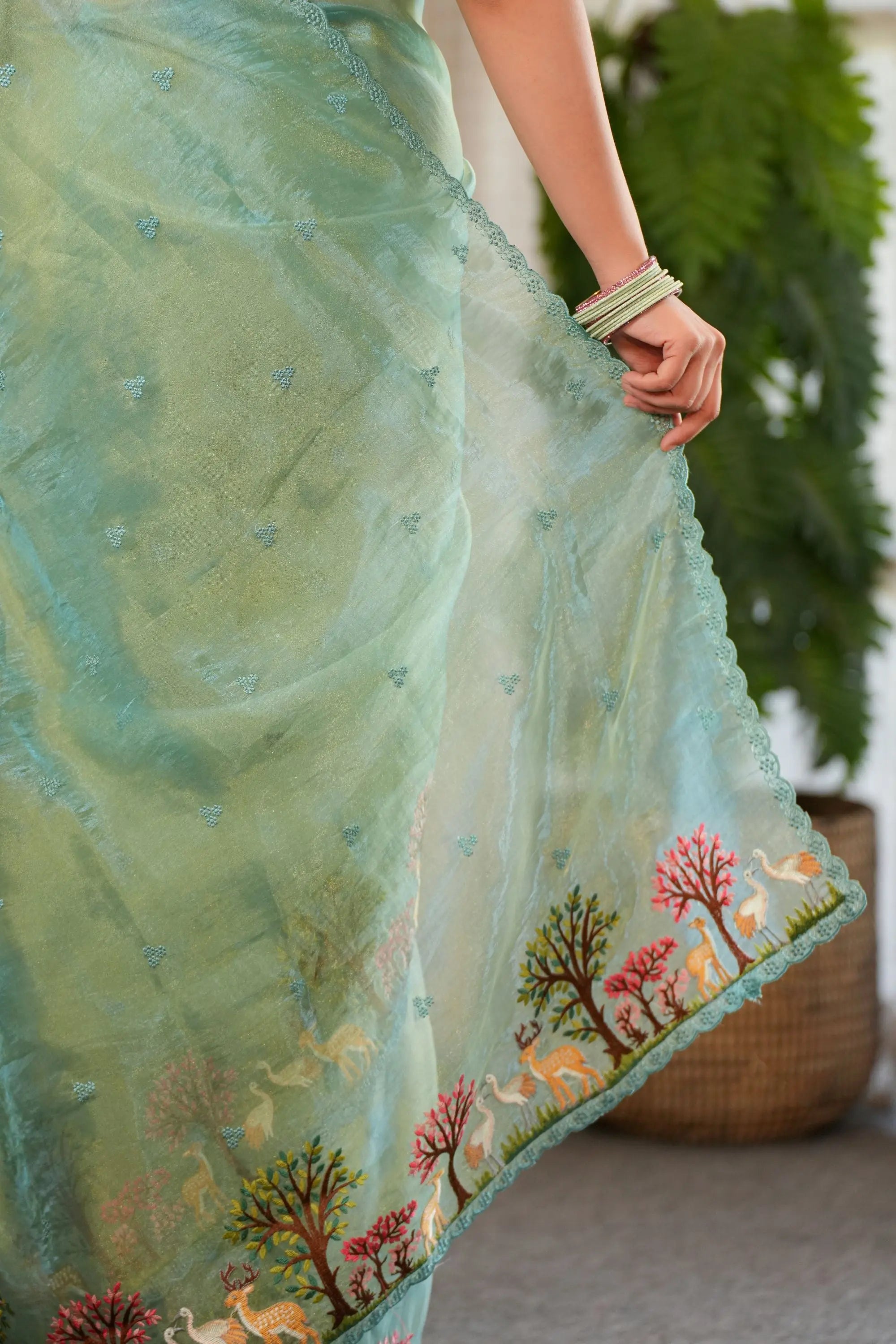 Image of Anika : Teal shade of Embroidered tissue saree with unstitched blouse Sathiraa Sarees